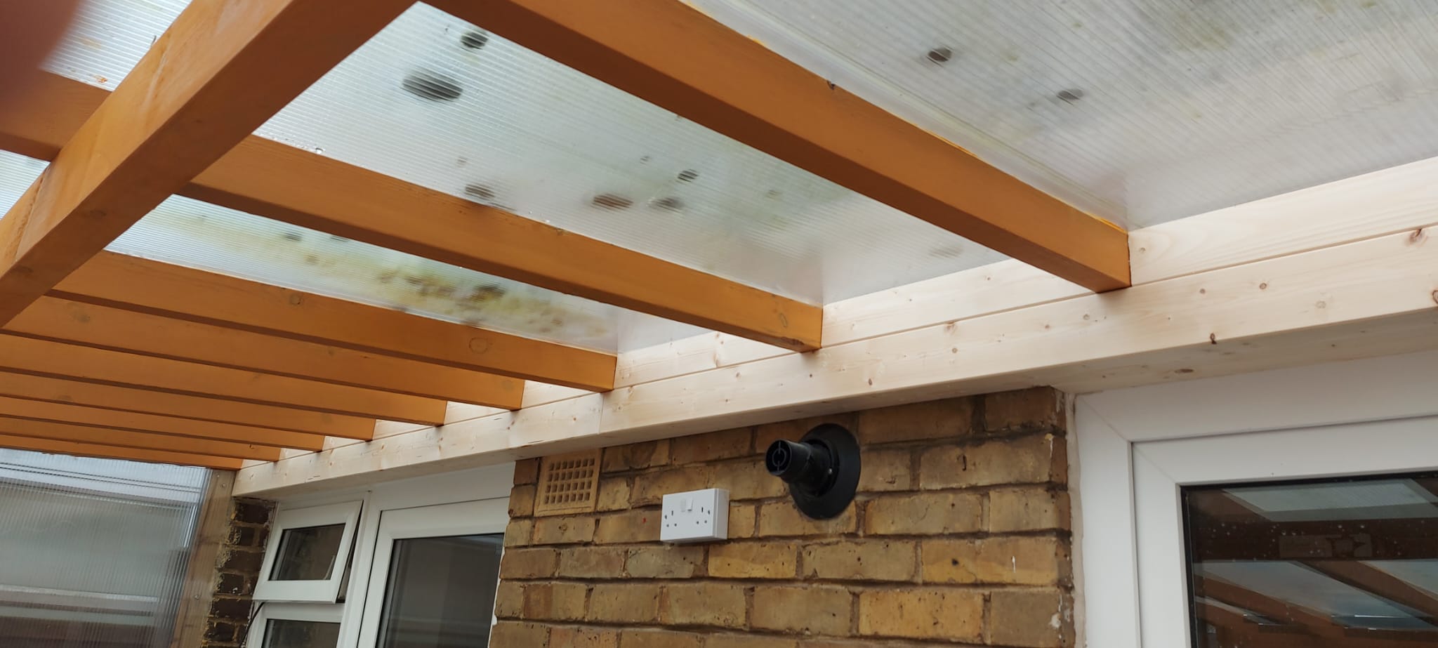A timber veranda that opens up the house.